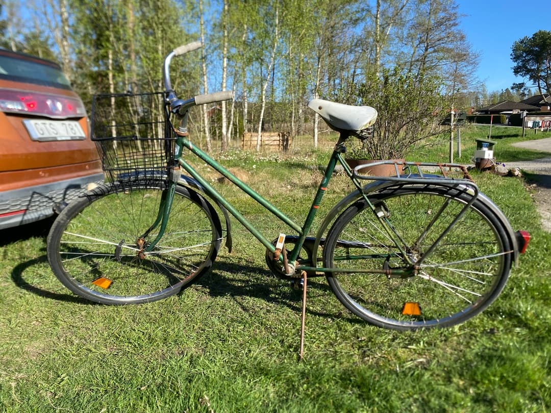 Cycling on a quiet Swedish country road in summer