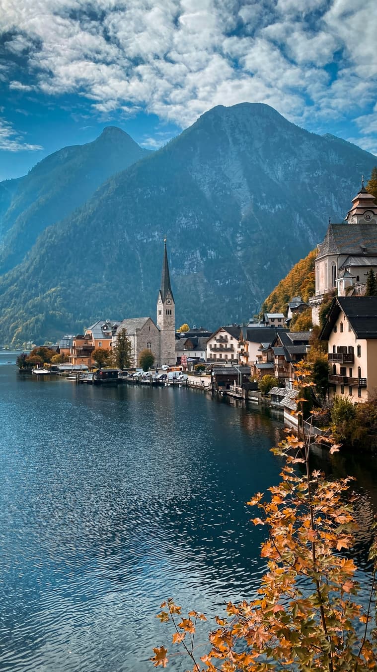 Austrian alpine landscape with mountain forests and meadows